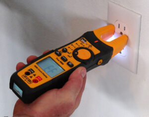 IDEAL 61-415 200A AC/DC TRMS TightSight® fork meter, Split Jaw Meter, w/ Flashlight & NCVT in use