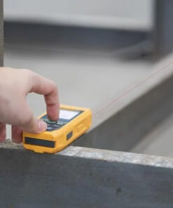 Laser distance meter in use